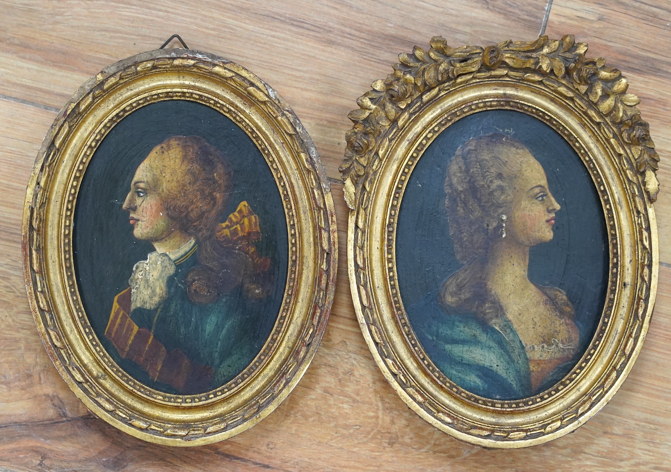 Early 20th century, pair of oval oils on panel, Portraits of a lady and gentleman, 13 x 9cm, housed in ornate gilt frames